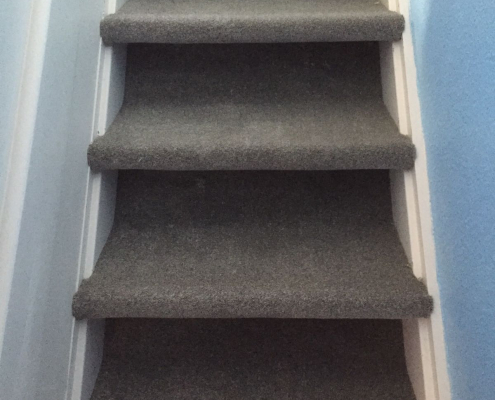 Open stairs with carpet wrapped