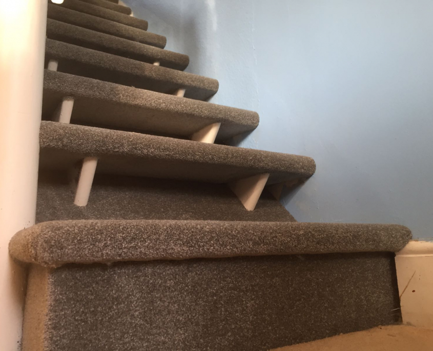 Open stairs with carpet wrapped