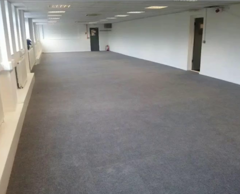 Grey carpet tiles in office flooring installation in Redhill