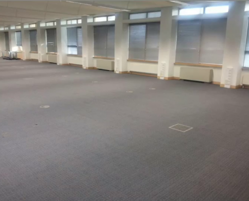 Finished grey carpet tile flooring in modern Redhill office space