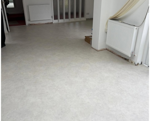 urrey kitchen-diner dining area with finished light stone LVT flooring