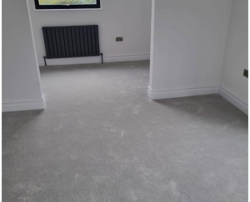 Reigate bedroom with grey, deep pile carpet fitted