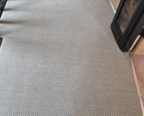 First-floor landing in a Surrey home with flatweave herringbone carpet installed
