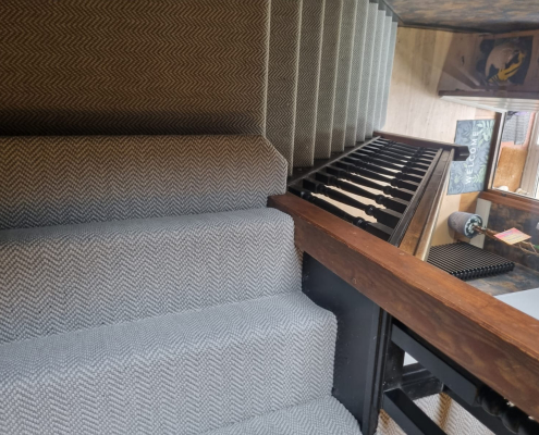 Surrey staircase featuring flatweave herringbone carpet