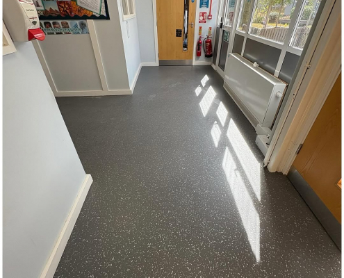 School classroom with grey safety flooring