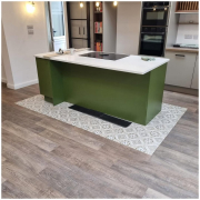 Surrey kitchen-diner with oak LVT wide plank flooring installed, showing warm tones and textured surface