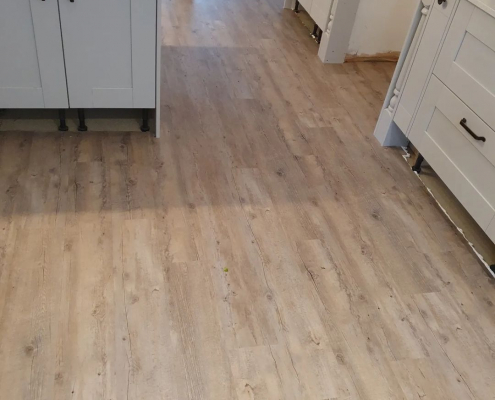Kitchen oak plank LVT installation Reigate kitchen with oak effect LVT flooring installed